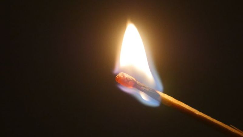 Single match flaring in the dark